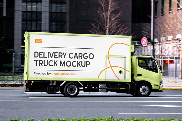 Free Delivery Truck on Street Mockup PSD Template