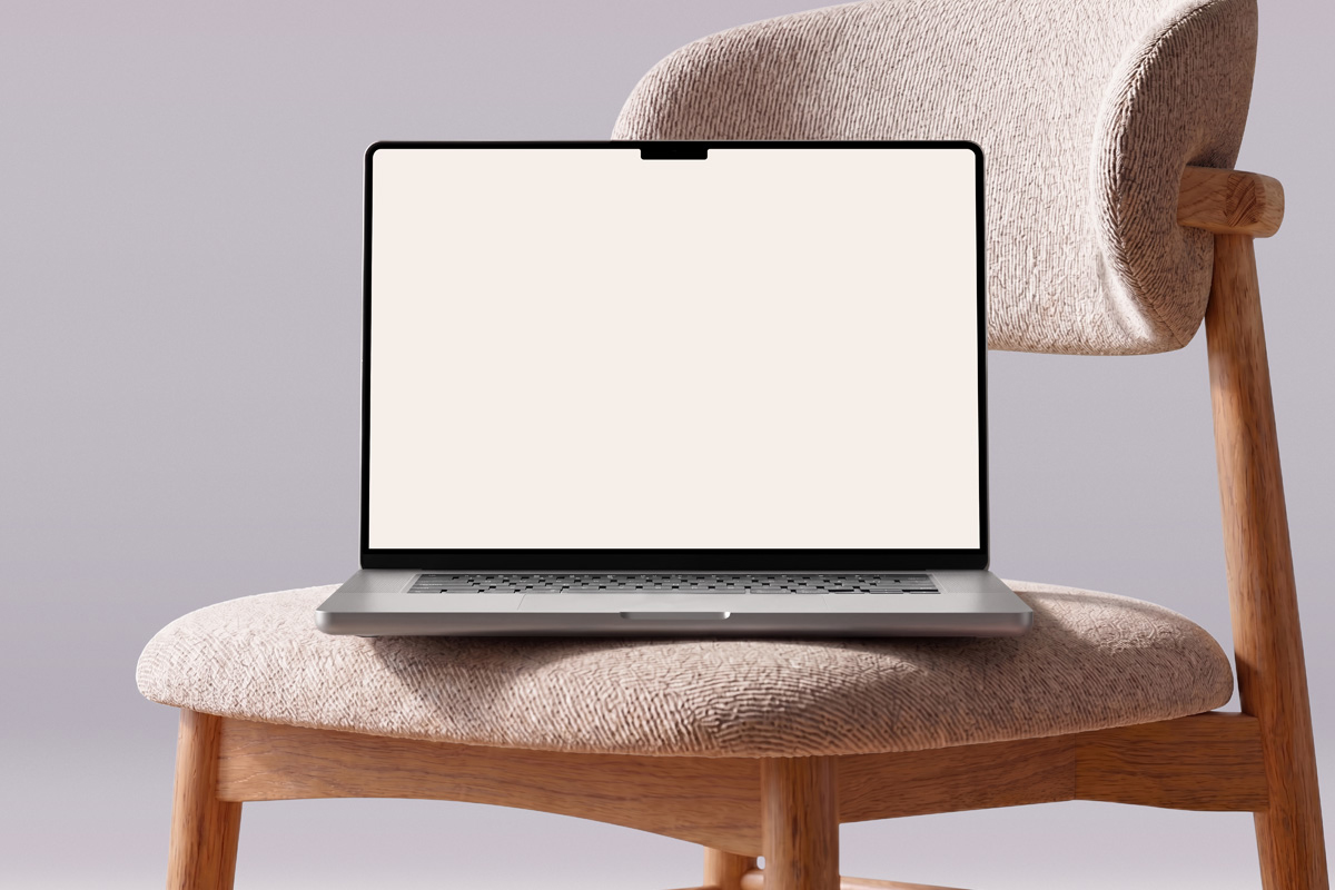 Free Macbook Pro on Boucle Chair Mockup PSD Template