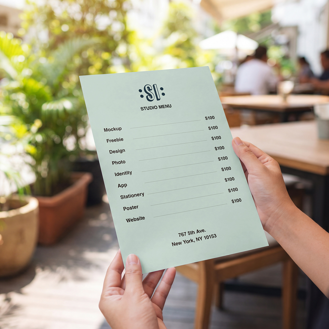 Free Menu Card in Hands Mockup PSD Template