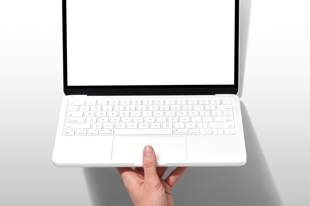 Free Top View MacBook Neo Mockup PSD Template